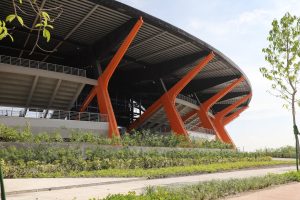 a stadium with orange pillars