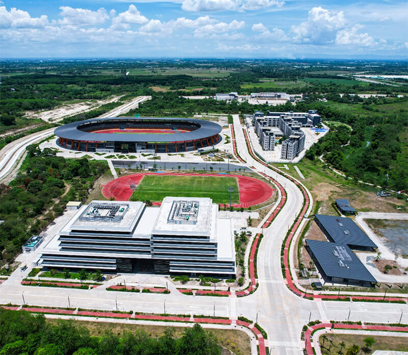 an aerial view of athletic stadium and a road