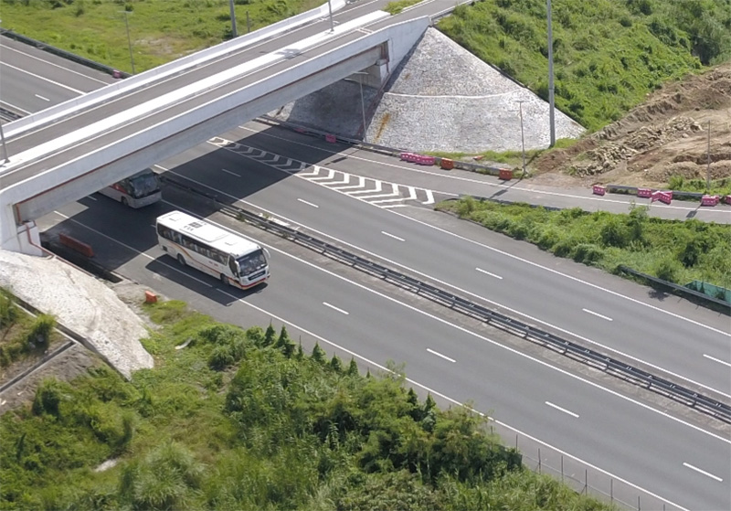a bus driving on a road