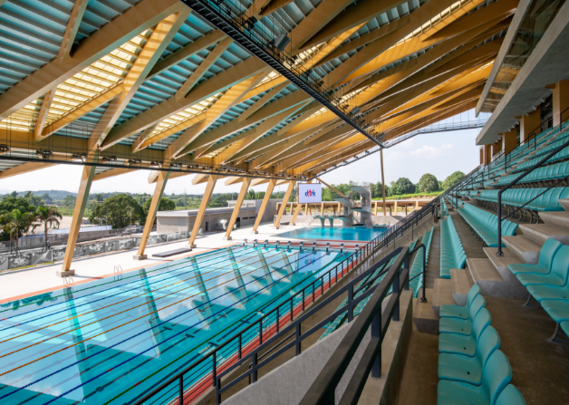 a swimming pool with blue seats